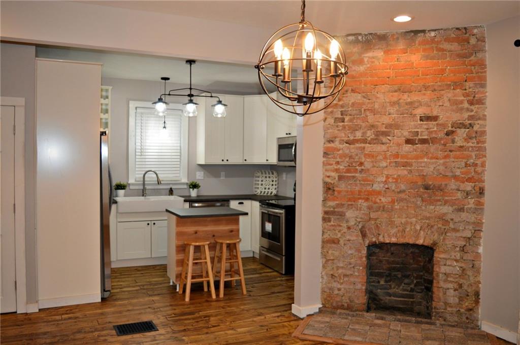 223 Mercer Street Butler, PA 16001 - Photo 4 of 21 Exposed brick, new kitchen, removed wall.