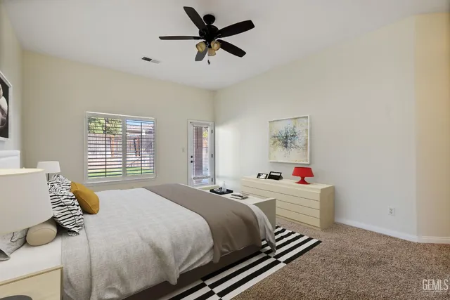 a bathroom with a sink double vanity granite and a mirror