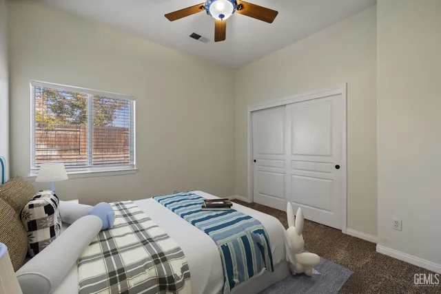 a bathroom with a sink double vanity and a mirror