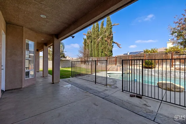 a view of a garden with a bench