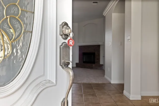 a view of a livingroom with furniture and a fireplace