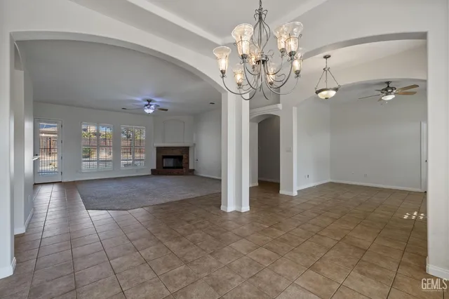 a view of a hallway with a chandelier