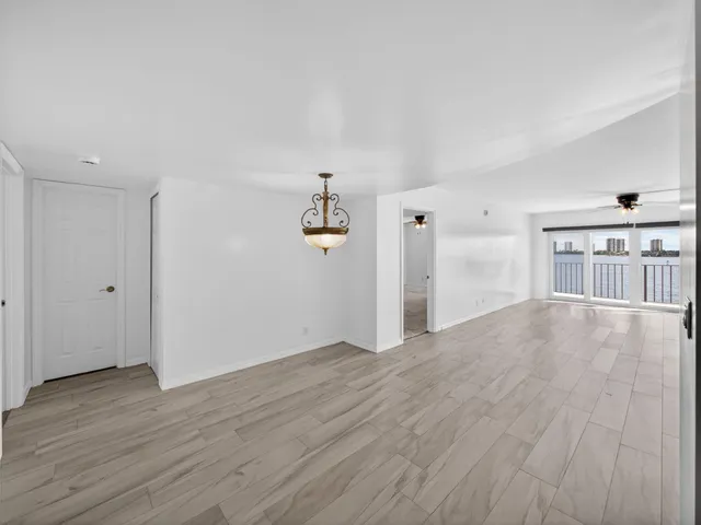 a view of a livingroom with wooden floor