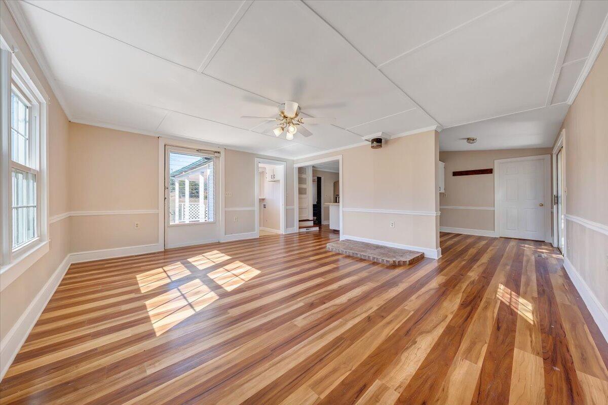 460 Thompson Ridge Road Ferrum, VA 24088 - Photo 20 of 48 a view of empty room with wooden floor and fan