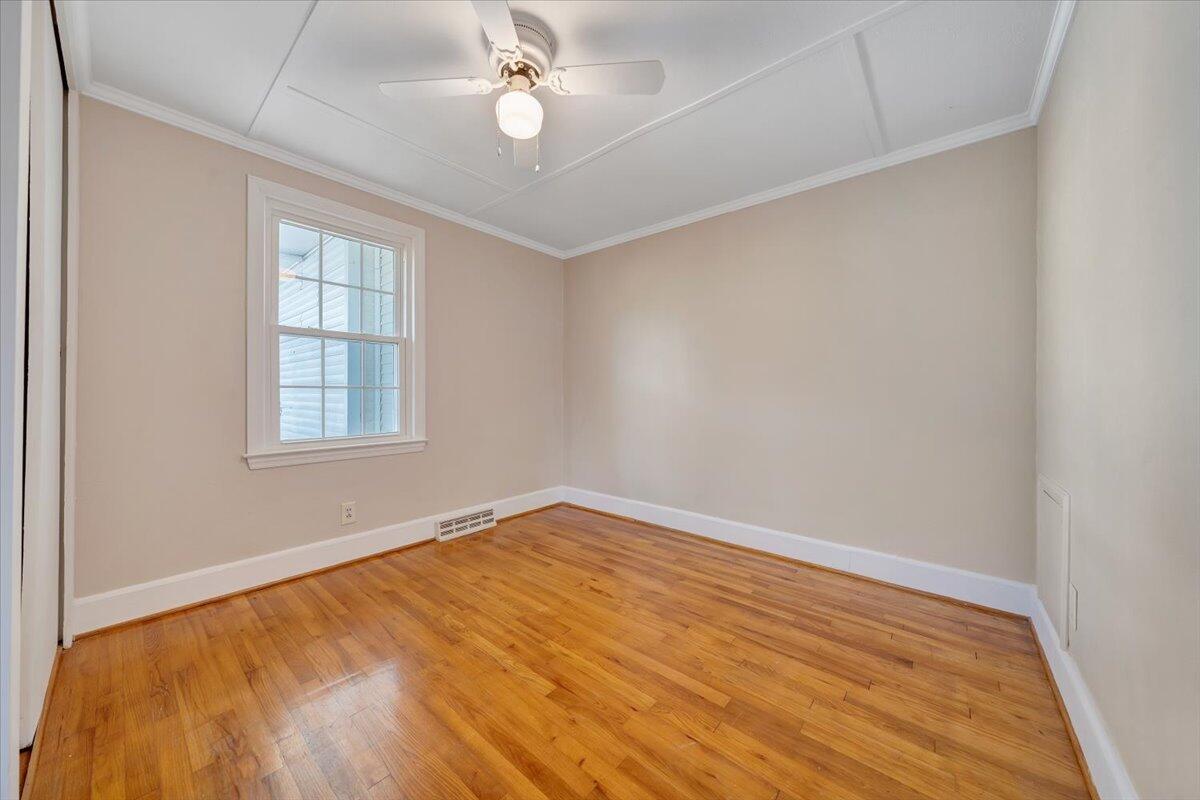 460 Thompson Ridge Road Ferrum, VA 24088 - Photo 27 of 48 wooden floor in an empty room with a window