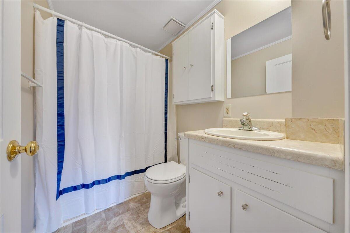 460 Thompson Ridge Road Ferrum, VA 24088 - Photo 28 of 48 a bathroom with a sink toilet and shower