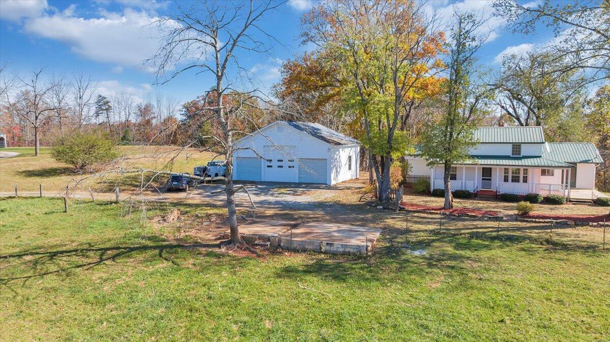 460 Thompson Ridge Road Ferrum, VA 24088 - Photo 3 of 48 a house that has a tree in front of it