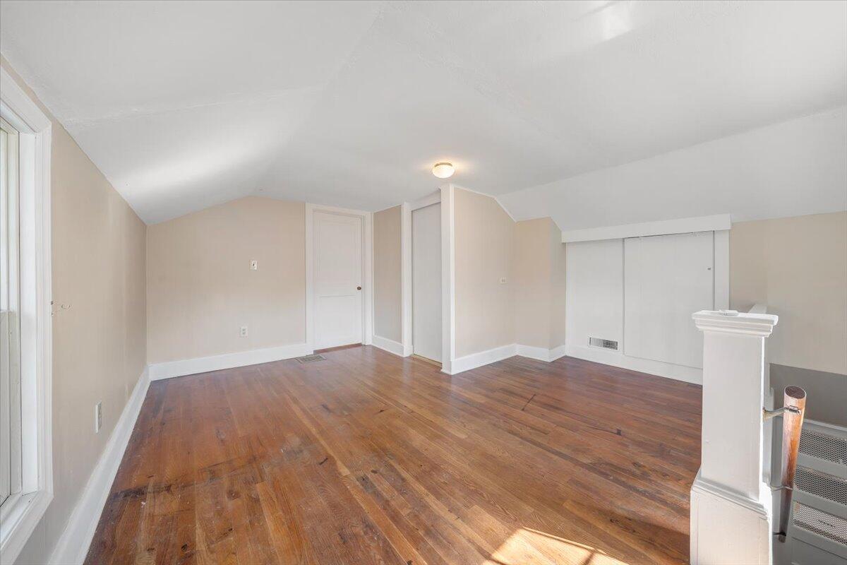 460 Thompson Ridge Road Ferrum, VA 24088 - Photo 32 of 48 a view of an empty room with window and wooden floor