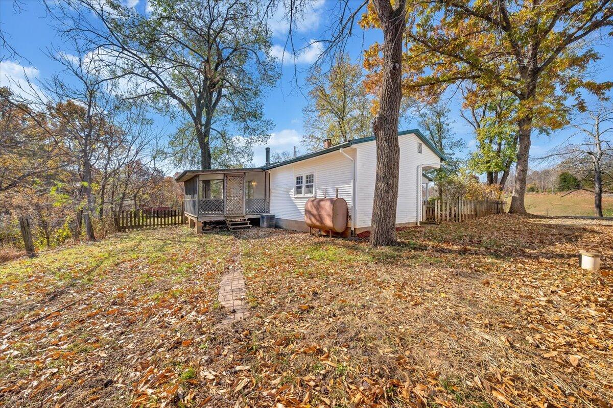 460 Thompson Ridge Road Ferrum, VA 24088 - Photo 35 of 48 a view of a house with backyard and tree