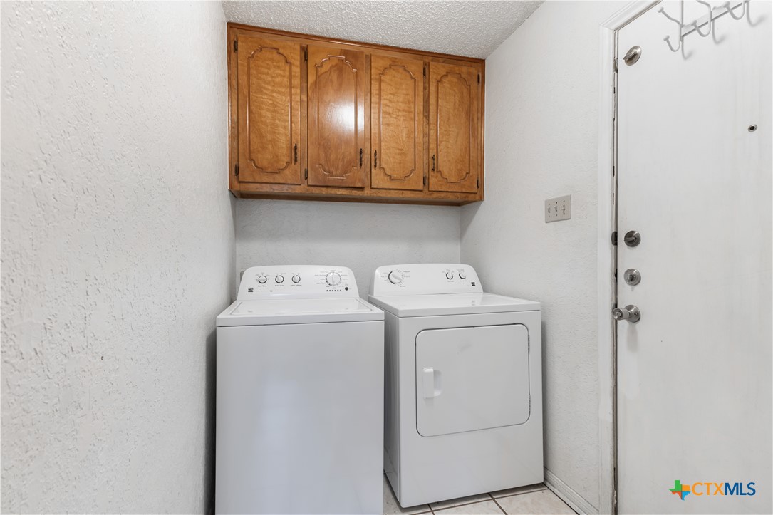 144 Jordan Loop Nolanville, TX 76559 - Photo 20 of 20 a utility room with dryer and washer
