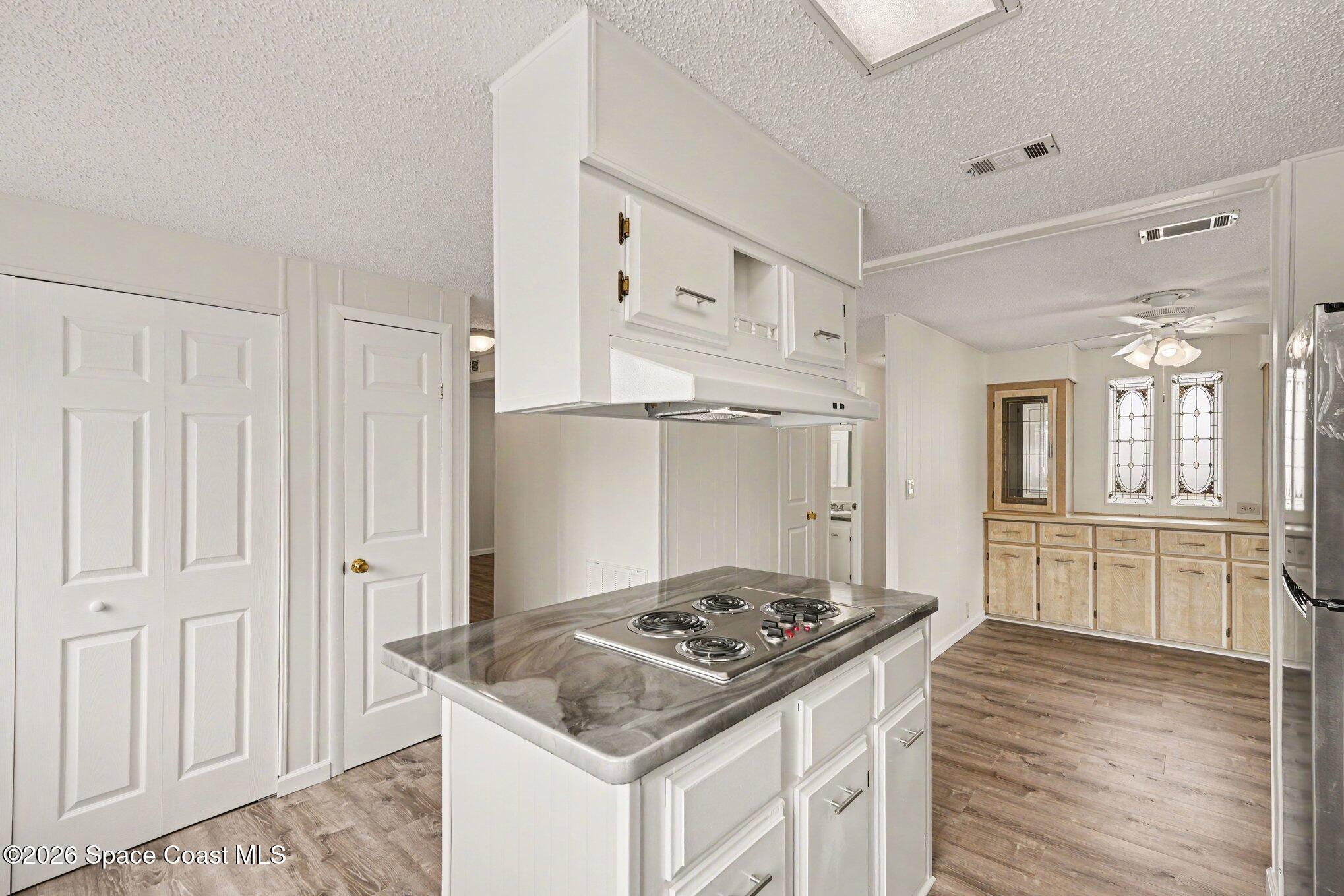 604 Breezeway Drive Cocoa, FL 32926 - Photo 9 of 26 Updated kitchen with island