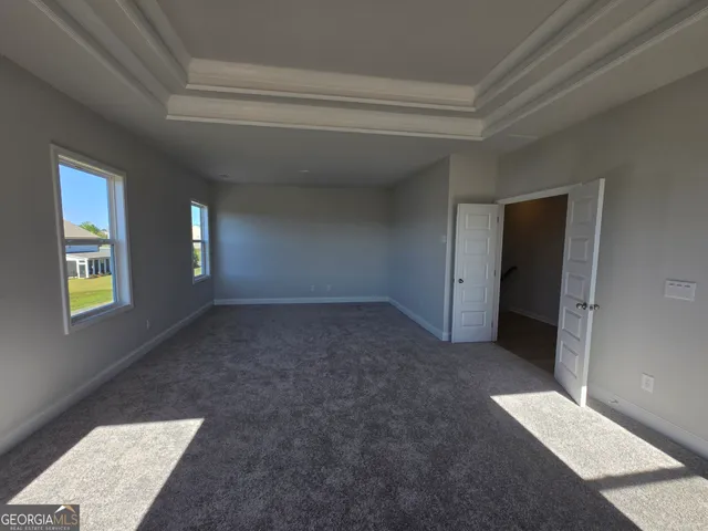 a bathroom with a toilet and a bathtub