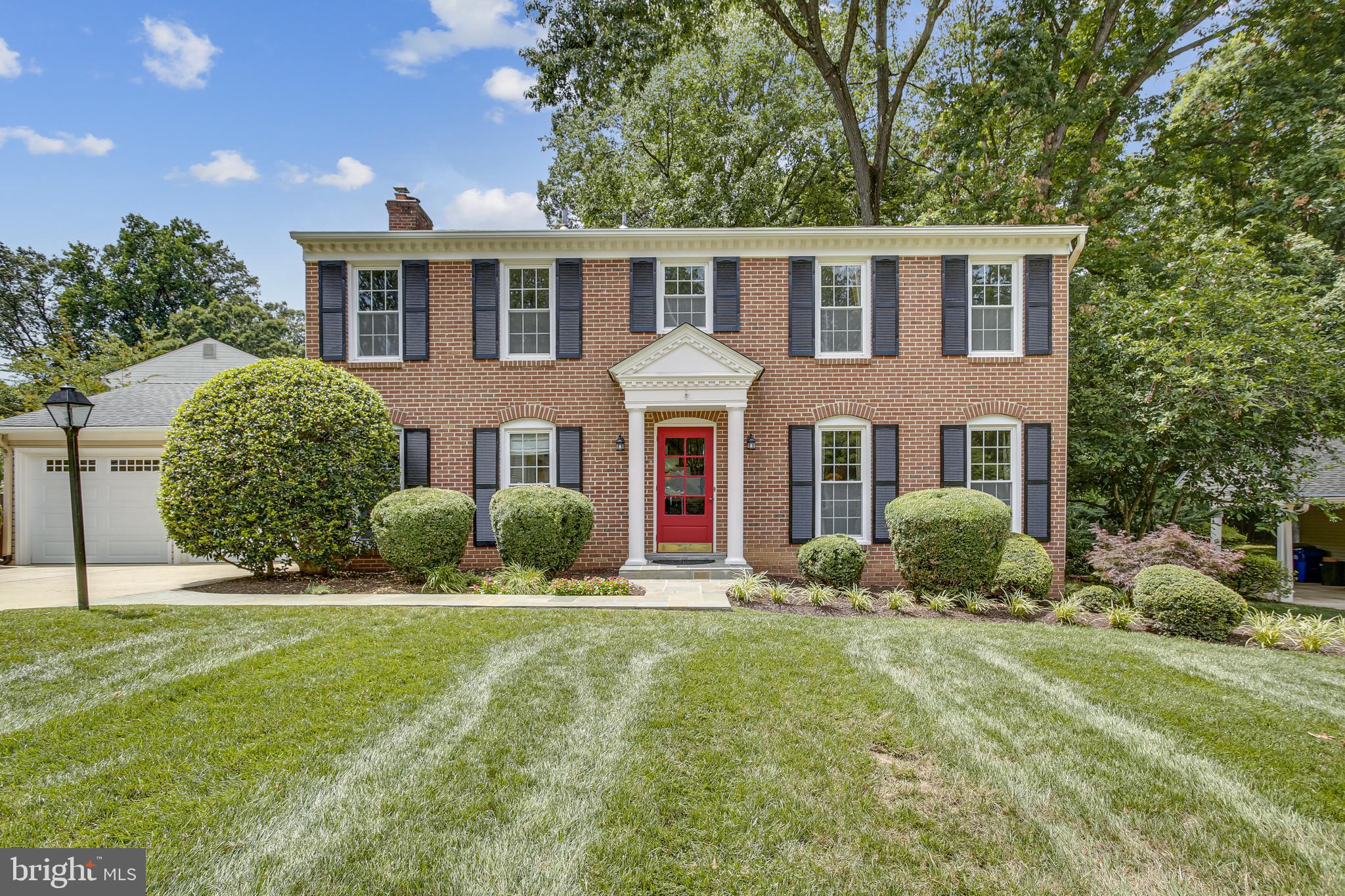 2314 Tanglevale Drive Vienna, VA 22181 - Photo 2 of 74 Majestic Brick Front with that vibrant Red Door