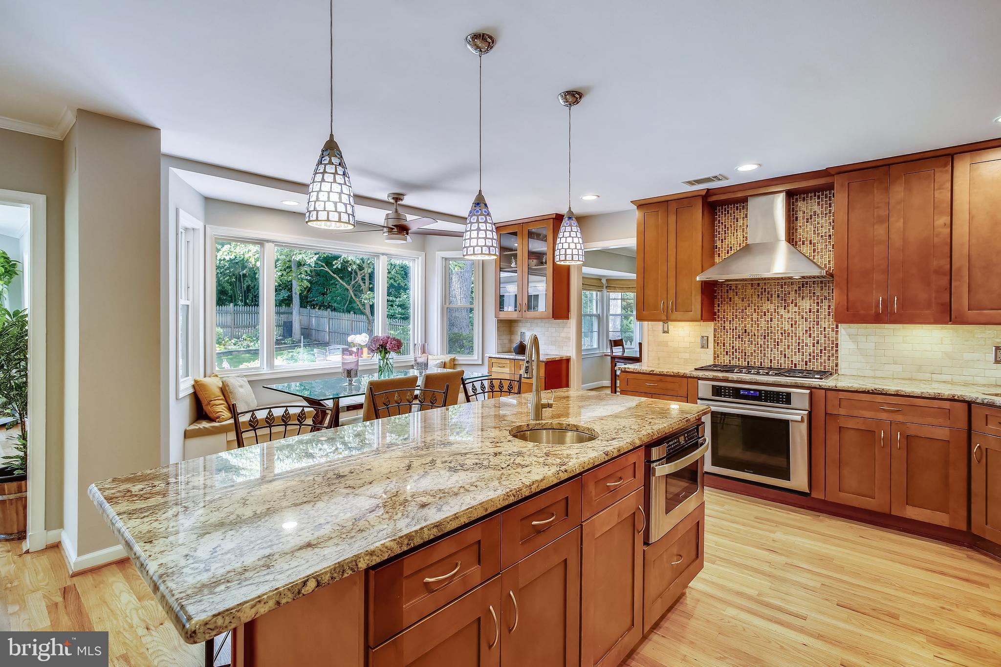 2314 Tanglevale Drive Vienna, VA 22181 - Photo 21 of 74 Generous Island with a prep sink