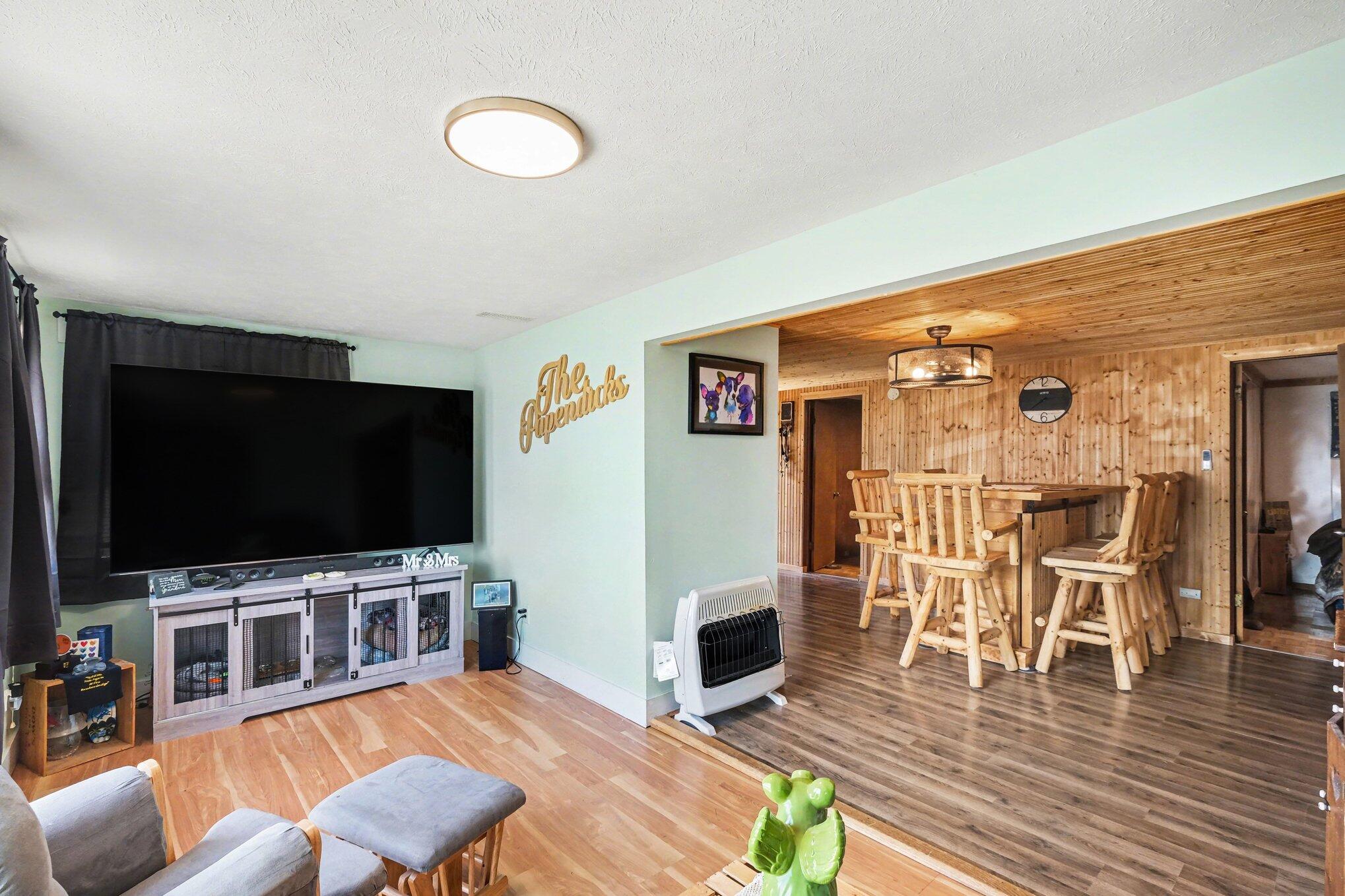 13351 Clausen Road Trufant, MI 49347 - Photo 7 of 17 Living room and dining Clausen