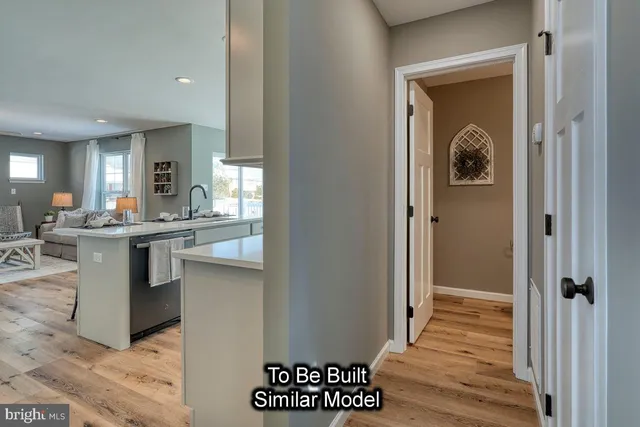 a bathroom with a sink a mirror and a window
