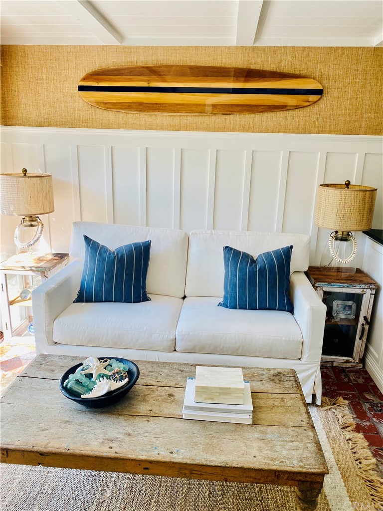 33965 Cape Cove Dana Point, CA 92629 - Photo 16 of 43 a living room with furniture and a table