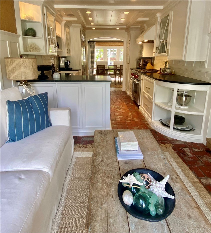 33965 Cape Cove Dana Point, CA 92629 - Photo 17 of 43 a living room with furniture and wooden floor
