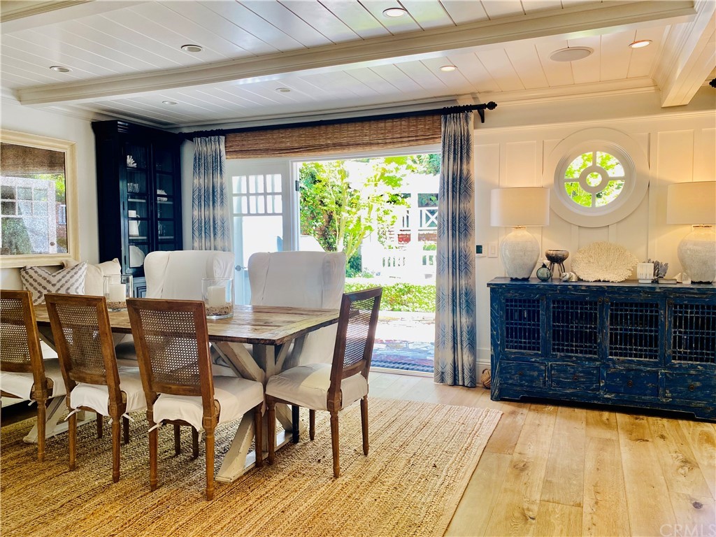 33965 Cape Cove Dana Point, CA 92629 - Photo 19 of 43 a view of a dining room with furniture and a large window