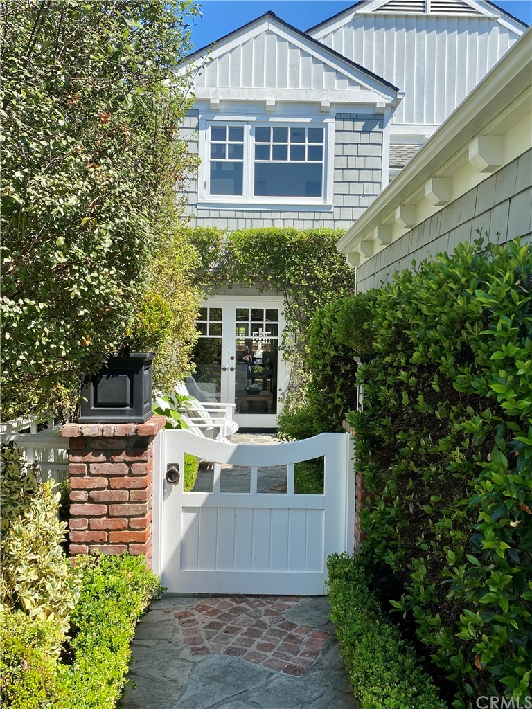 33965 Cape Cove Dana Point, CA 92629 - Photo 2 of 43 a view of a house with a yard and potted plants