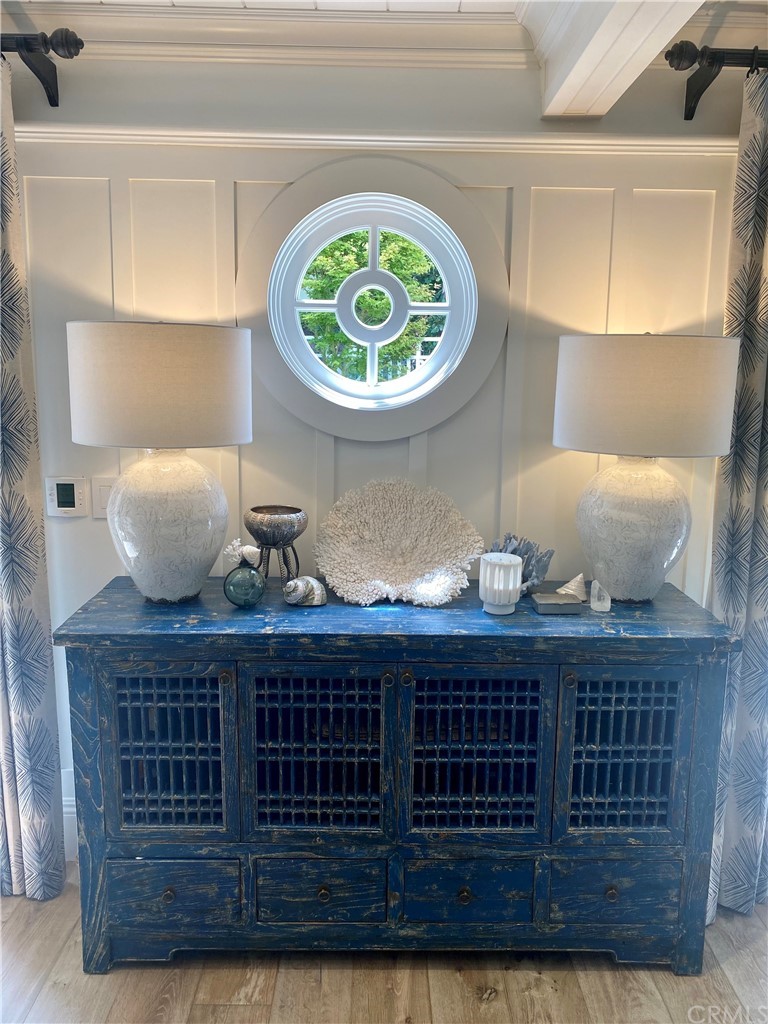 33965 Cape Cove Dana Point, CA 92629 - Photo 23 of 43 a kitchen with a cabinets and a table