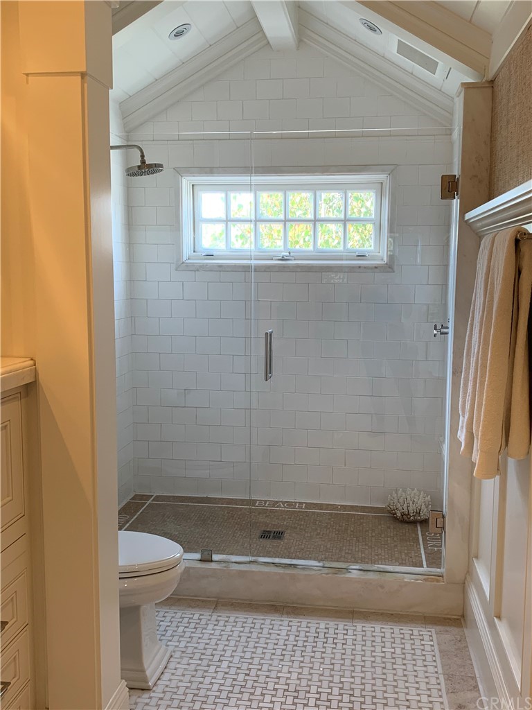 33965 Cape Cove Dana Point, CA 92629 - Photo 29 of 43 a bathroom with a sink a toilet and shower