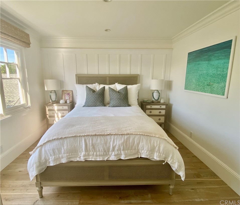 33965 Cape Cove Dana Point, CA 92629 - Photo 33 of 43 a bed sitting in a bedroom next to a window