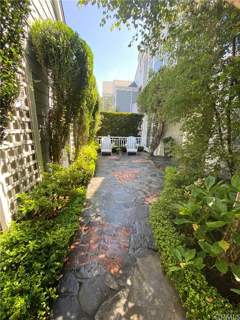 33965 Cape Cove Dana Point, CA 92629 - Photo 40 of 43 a view of a house with a garden