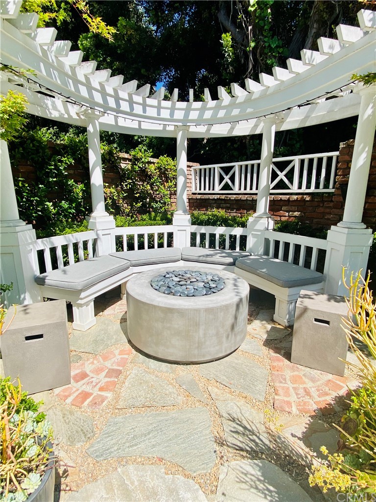 33965 Cape Cove Dana Point, CA 92629 - Photo 6 of 43 a building outdoor space with patio furniture and potted plants