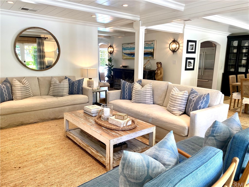 33965 Cape Cove Dana Point, CA 92629 - Photo 7 of 43 a living room with furniture and a mirror