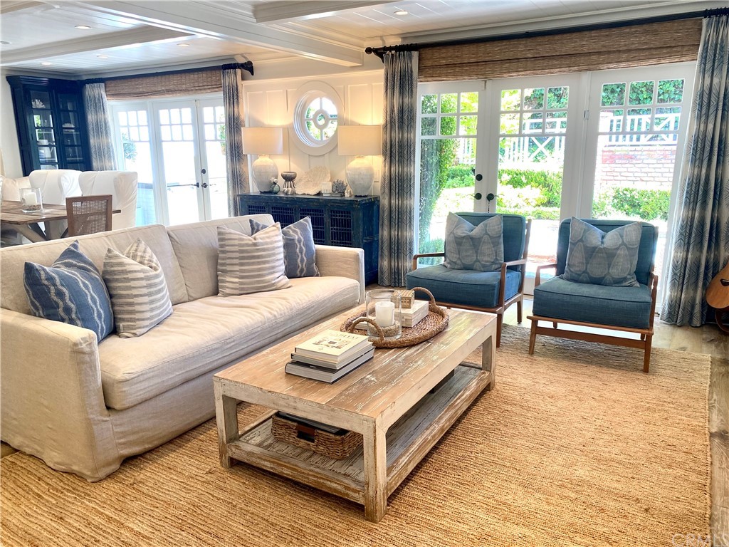 33965 Cape Cove Dana Point, CA 92629 - Photo 8 of 43 a living room with furniture and a large window