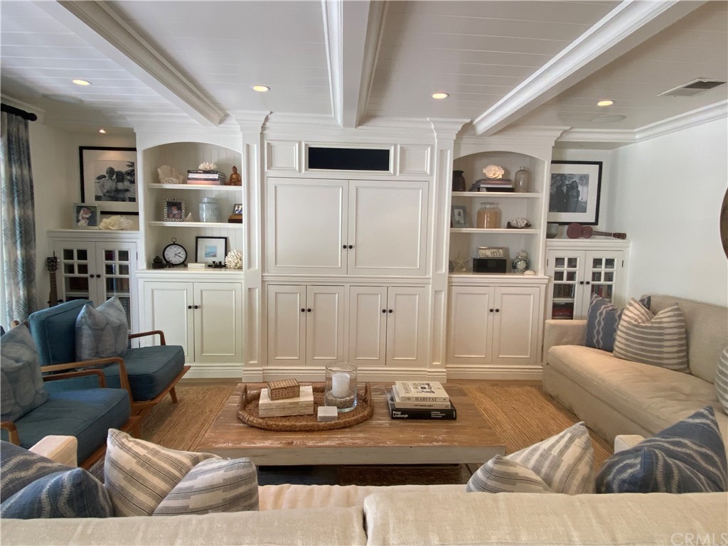 33965 Cape Cove Dana Point, CA 92629 - Photo 9 of 43 a living room with furniture and view of kitchen