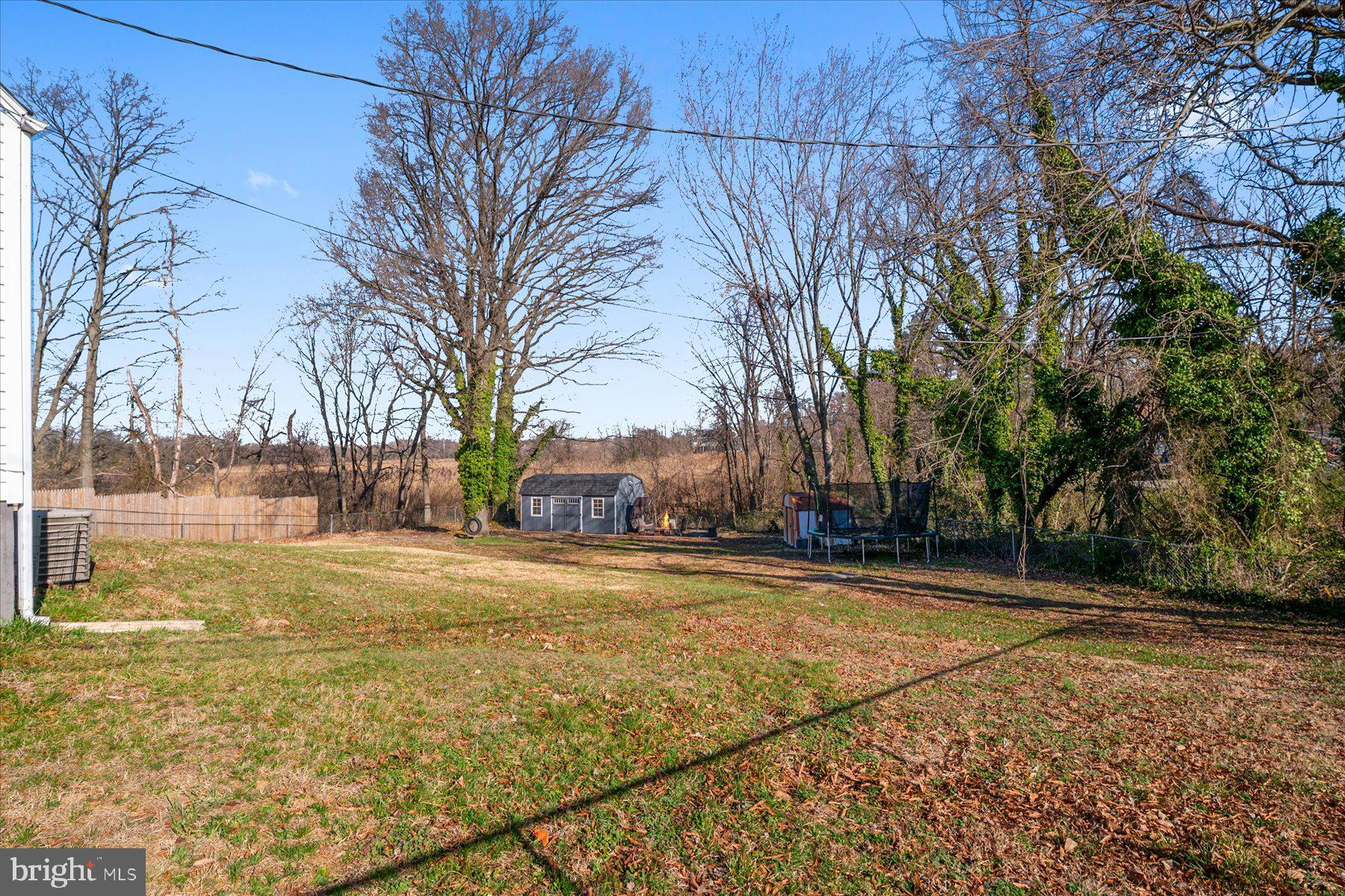 45 Clipper Road Essex, MD 21221 - Photo 30 of 36 a view of a yard with a large trees
