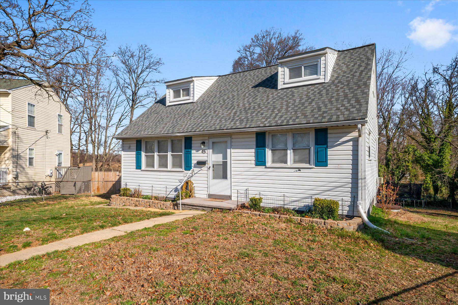 45 Clipper Road Essex, MD 21221 - Photo 3 of 36 a front view of a house with a yard