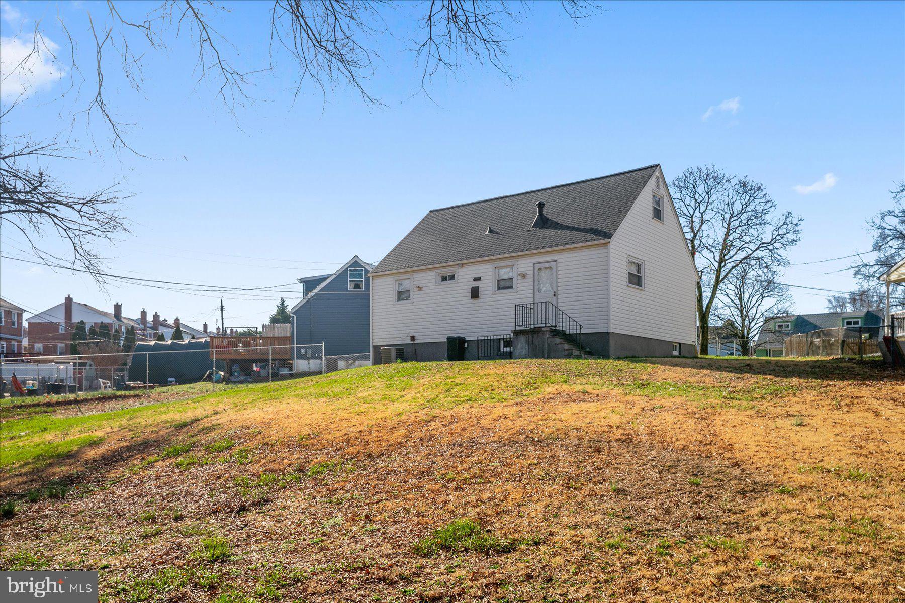 45 Clipper Road Essex, MD 21221 - Photo 33 of 36 a view of a house with a yard