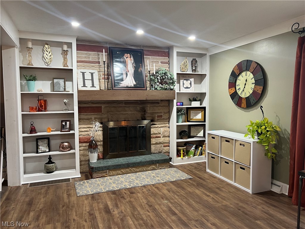 1935 Far View Road Akron, OH 44312 - Photo 6 of 25 Living room featuring a fireplace and dark hardwood / wood-style flooring