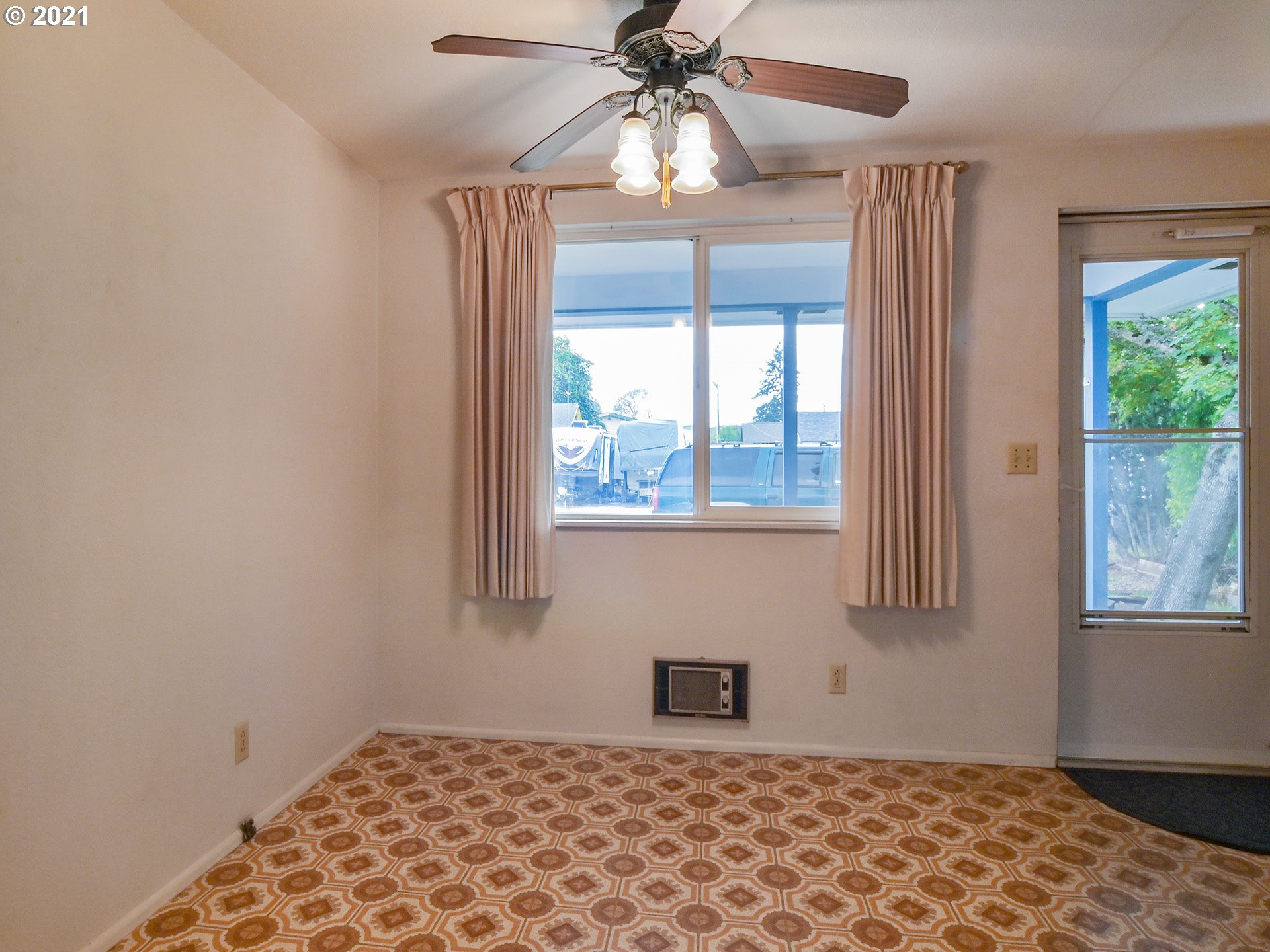 1509 6th Street Springfield, OR 97477 - Photo 14 of 30 a bedroom with a bed and a window