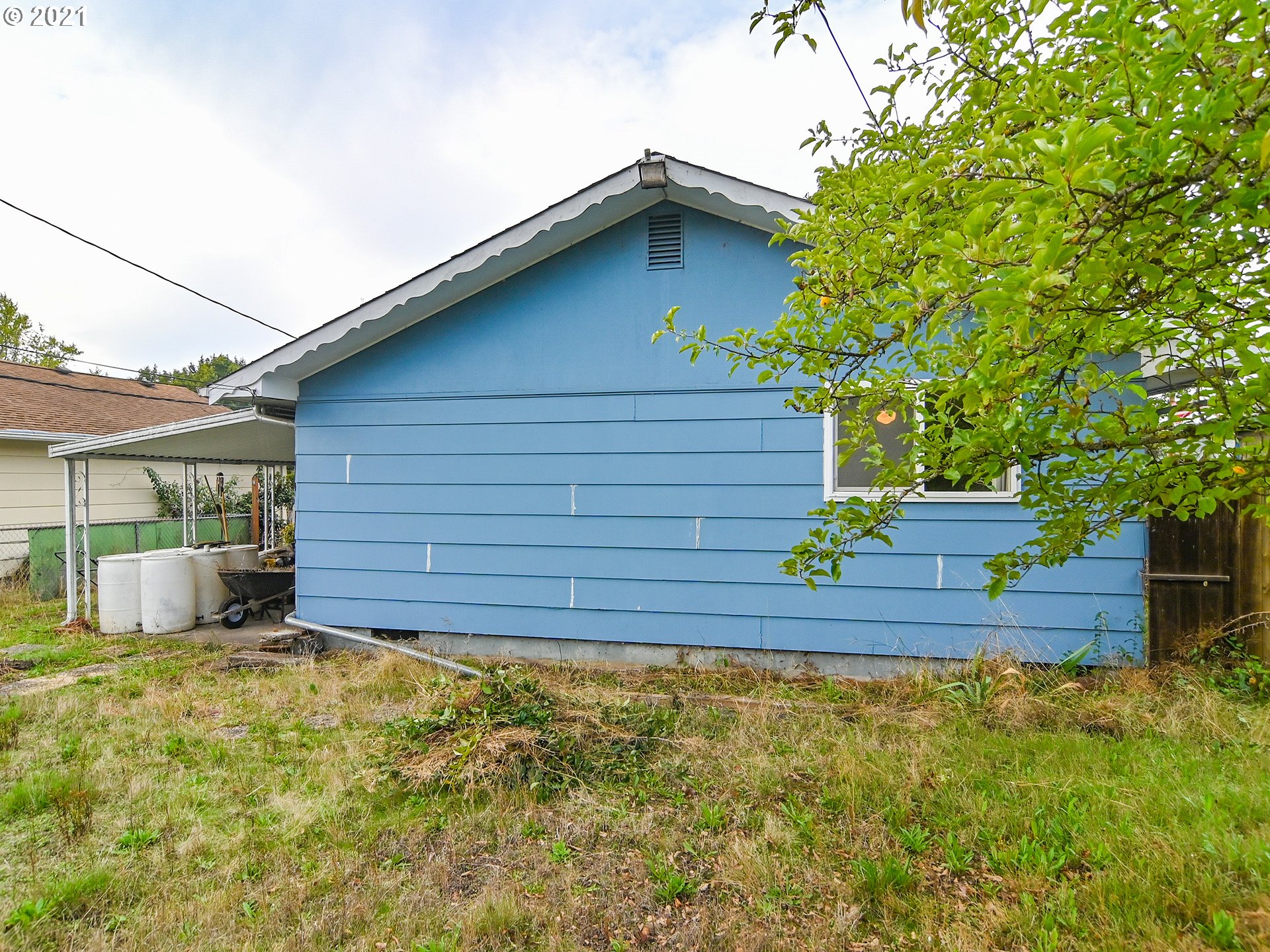 1509 6th Street Springfield, OR 97477 - Photo 27 of 30 a view of a house with a yard