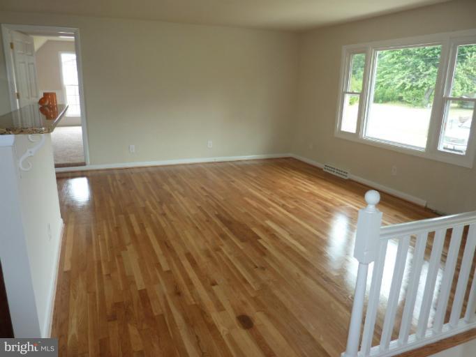 123 Little Whim Road Fredericksburg, VA 22405 - Photo 10 of 17 a view of empty room with wooden floor