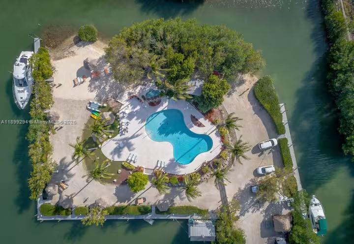 100 Morris Lane, Unit B2 Key Largo, FL 33037 - Photo 3 of 49 an aerial view of a house with a yard and lake view