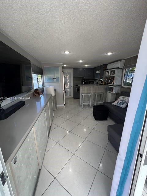 100 Morris Lane, Unit B2 Key Largo, FL 33037 - Photo 5 of 49 a kitchen with stainless steel appliances kitchen island granite countertop a sink and cabinets