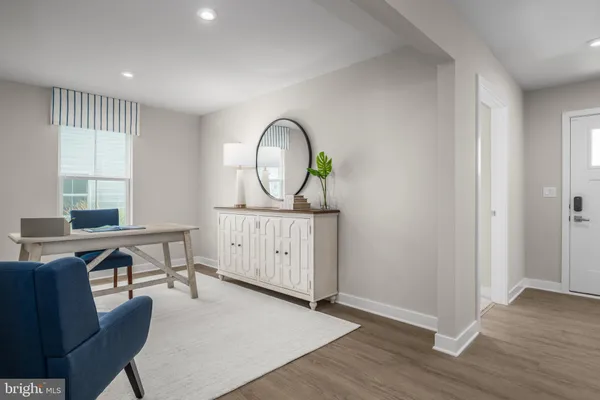 a view of a livingroom with furniture