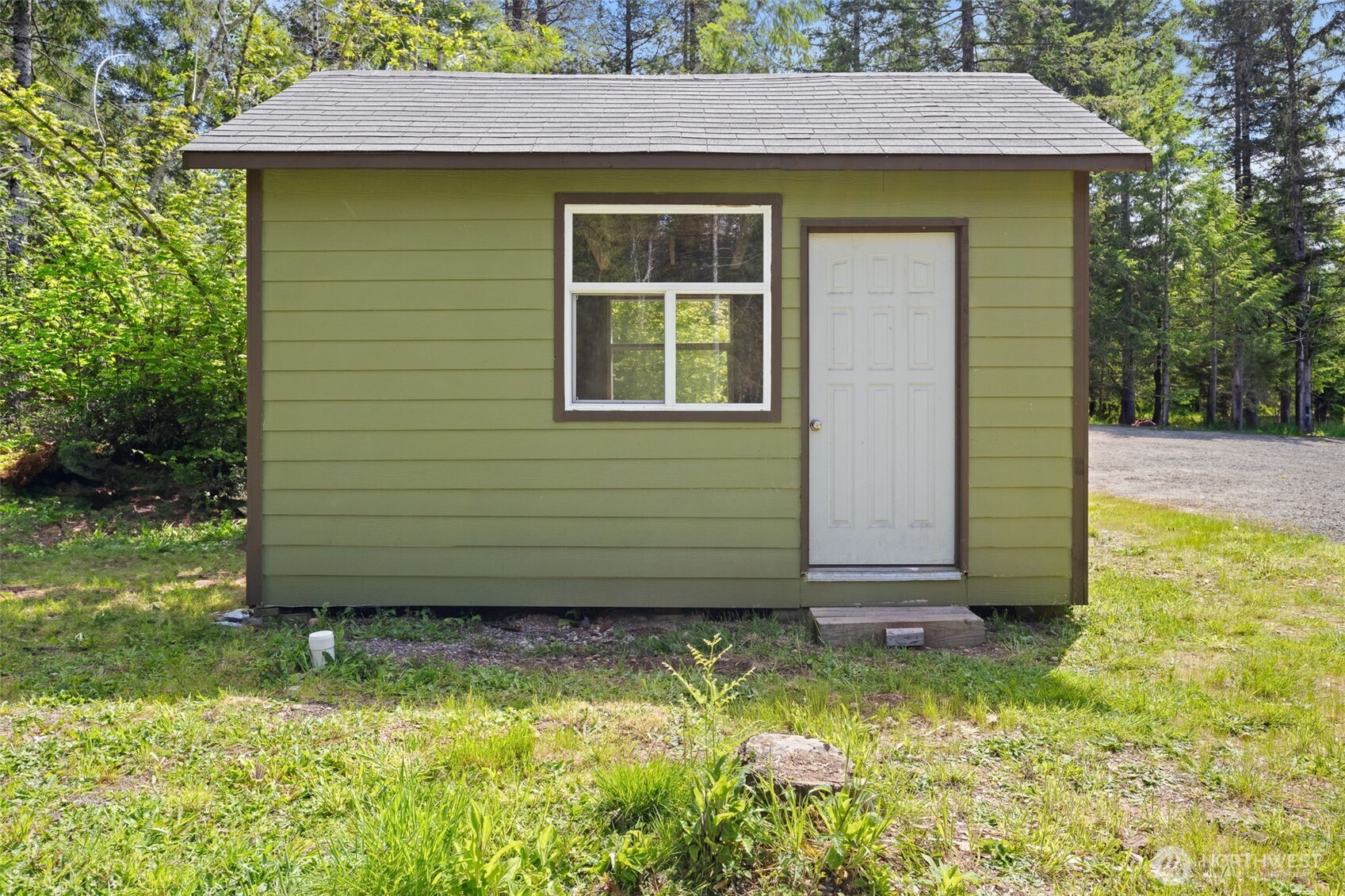 401 East Sunset Ridge Road Union, WA 98592 - Photo 25 of 37 a front view of a house having yard