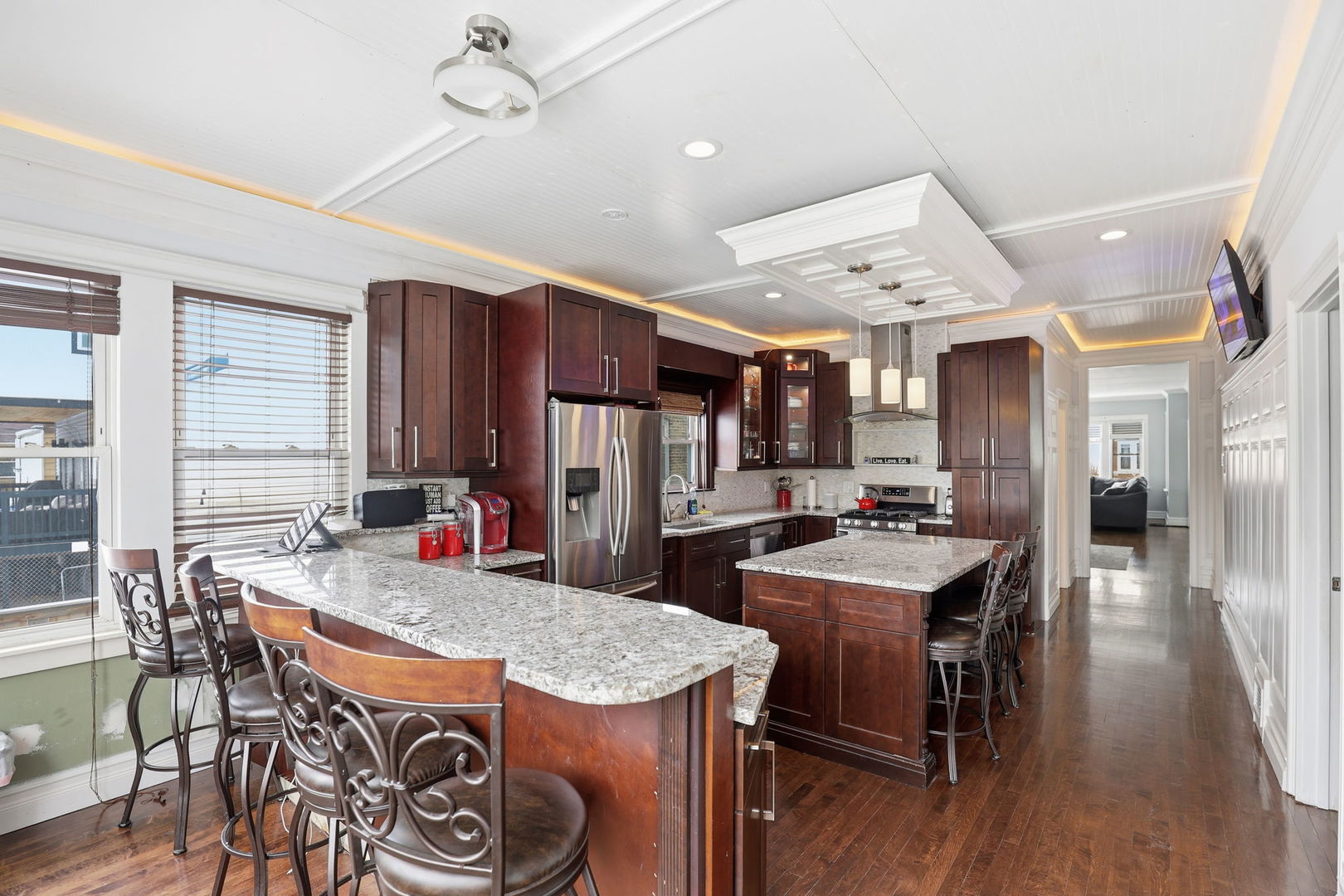 2407 Highland Avenue Berwyn, IL 60402 - Photo 12 of 25 a view of a dining room with furniture and wooden floor
