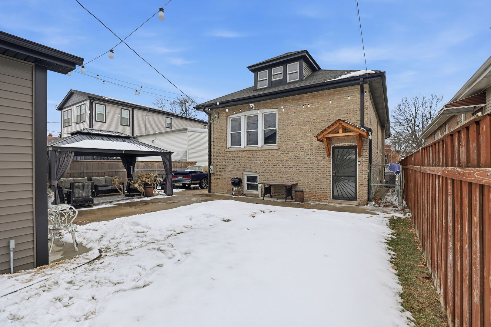 2407 Highland Avenue Berwyn, IL 60402 - Photo 24 of 25 a view of a house with wooden fence