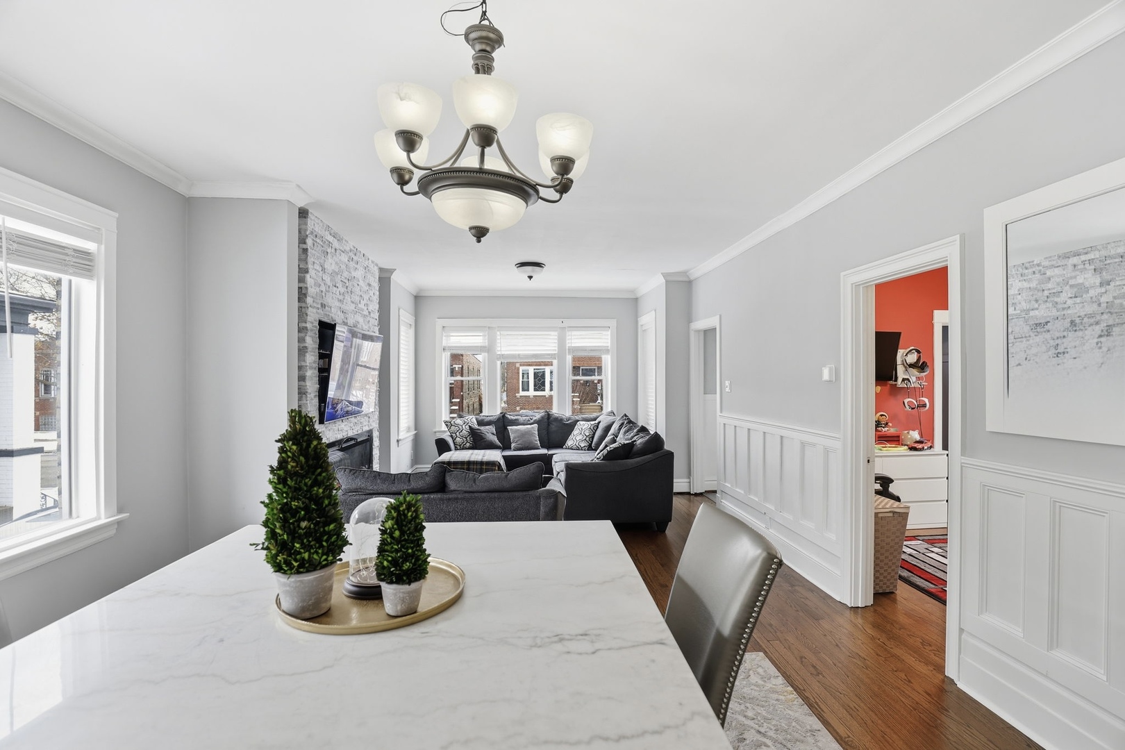 2407 Highland Avenue Berwyn, IL 60402 - Photo 9 of 25 a view of a livingroom with furniture windows cabinet and a fireplace