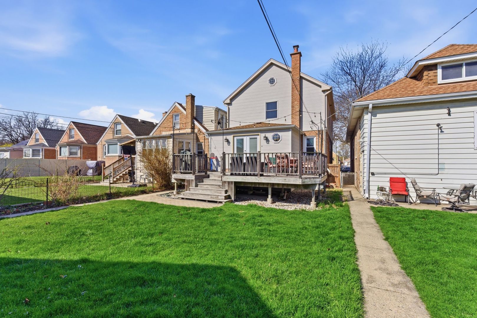 5325 North Meade Avenue Chicago, IL 60630 - Photo 18 of 24 a front view of house with yard and green space