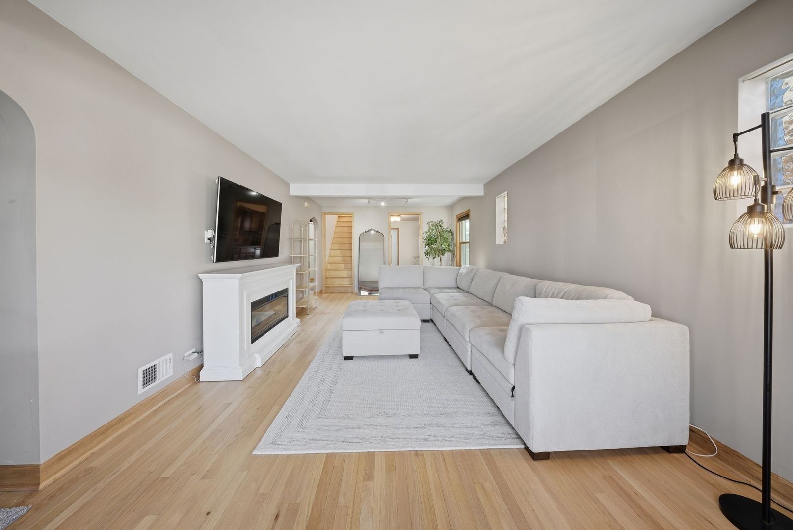 5325 North Meade Avenue Chicago, IL 60630 - Photo 2 of 24 a view of living room with furniture and flat screen tv