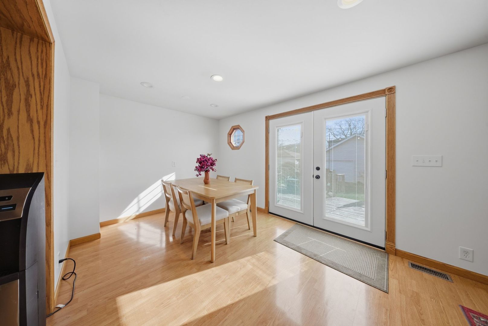 5325 North Meade Avenue Chicago, IL 60630 - Photo 4 of 24 a view of a dining room with furniture and wooden floor
