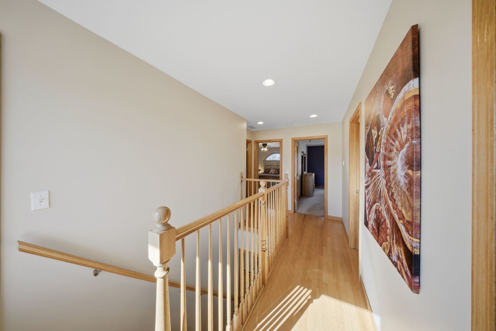 5325 North Meade Avenue Chicago, IL 60630 - Photo 8 of 24 a view of a hallway with wooden floor and staircase